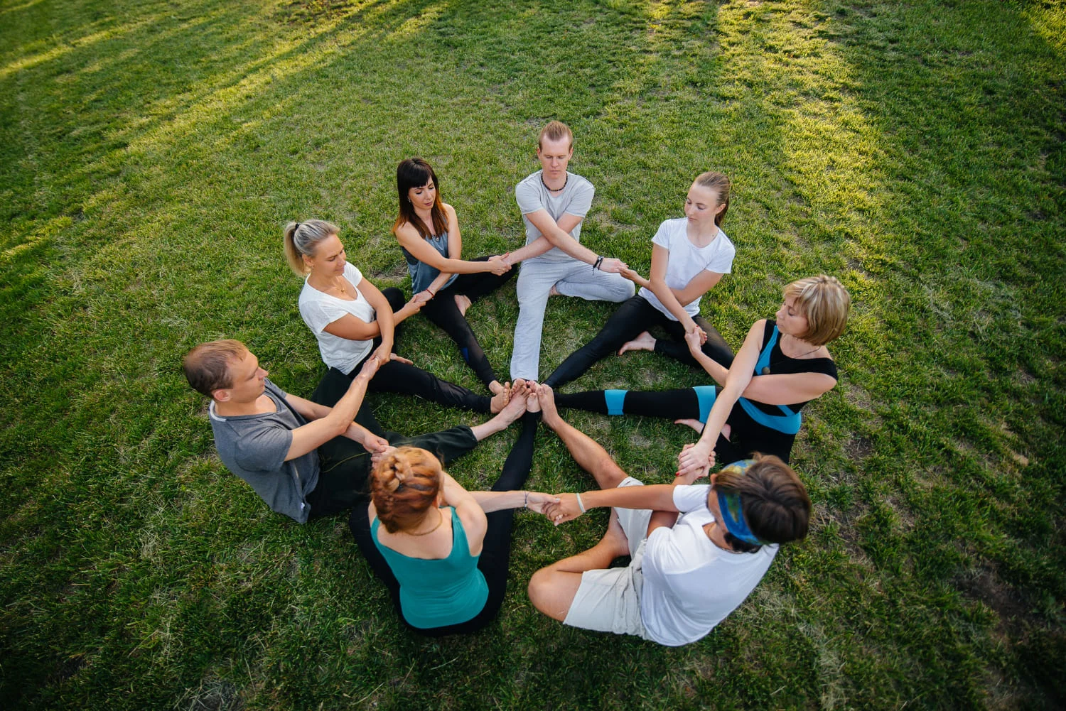 team in a circle in nature team in a circle in nature